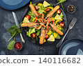 Gourmet Seafood Salad with Langoustines on Green Background, Flat lay. 140116682