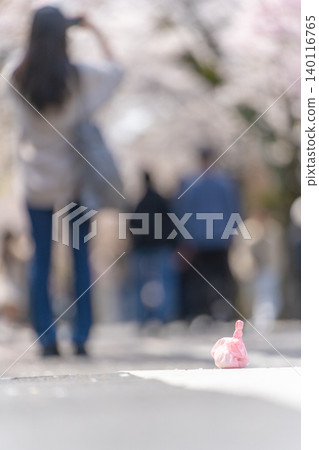 Garbage left behind in the cherry tree-lined street of Kamikitazawa Garbage left behind in the cherry tree-lined street of Kamikitazawa 140116765