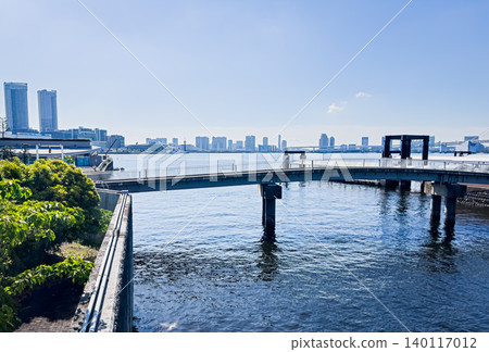 View of the Tokyo Bay waterfront promenade and Rainbow Bridge View of the Tokyo Bay waterfront promenade and Rainbow Bridge 140117012