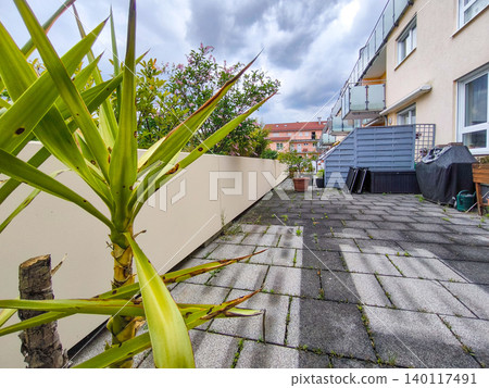 Rooftop Terrace with Wooden Trellis and Planter Box: Cozy Urban Garden Design in Residential Area Rooftop Terrace with Wooden Trellis and Planter Box: Cozy Urban Garden Design in Residential Area 140117491