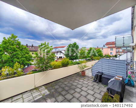 Rooftop Terrace with Wooden Trellis and Planter Box: Cozy Urban Garden Design in Residential Area 140117492