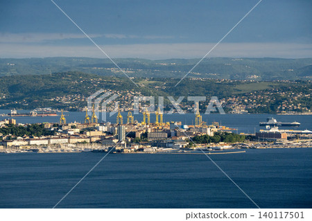 Aerial View Of Trieste City Harbour From Napoleonica Hiking Trail - Famous Climbing Bouldering Area, Gulf Of Trieste Adriatic Italy, Panoramic Karst Hillside Overlook Aerial View Of Trieste City Harbour From Napoleonica Hiking Trail - Famous Climbing Bouldering Area, Gulf Of Trieste Adriatic Italy, Panoramic Karst Hillside Overlook 140117501