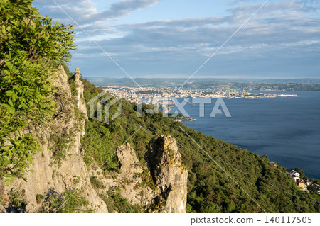 Aerial View Of Trieste City Harbour From Napoleonica Hiking Trail - Famous Climbing Bouldering Area, Gulf Of Trieste Adriatic Italy, Panoramic Karst Hillside Overlook Aerial View Of Trieste City Harbour From Napoleonica Hiking Trail - Famous Climbing Bouldering Area, Gulf Of Trieste Adriatic Italy, Panoramic Karst Hillside Overlook 140117505