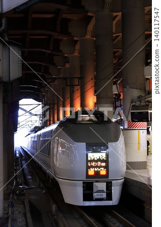 A 651 series Super Hitachi limited express train waiting to depart from the traditional ground-level platform at Ueno Station (photographed on February 4, 2011). A 651 series Super Hitachi limited express train waiting to depart from the traditional ground-level platform at Ueno Station (photographed on February 4, 2011). 140117547
