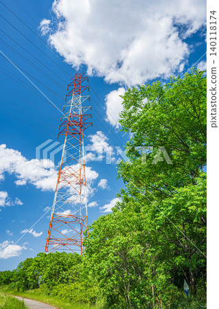 Power line tower standing on the Yodo River riverbed, Takatsuki City, Osaka Prefecture 140118174