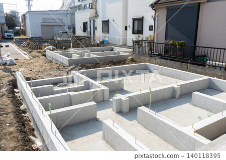 Concrete foundations of detached houses lined up in a residential development 3 Concrete foundations of detached houses lined up in a residential development 3 140118395