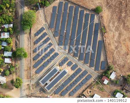Solar energy installation in a rural area with many solar panels Solar energy installation in a rural area with many solar panels 140119912