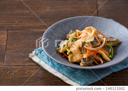Marinated horse mackerel with onion, carrot, and bell pepper. Marinated horse mackerel with onion, carrot, and bell pepper. 140121082