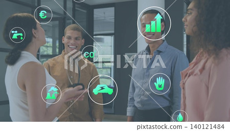 Discussing four-person team wearing biz-casual in office, viewing digital eco icons and wall panel Discussing four-person team wearing biz-casual in office, viewing digital eco icons and wall panel 140121484