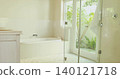 Featuring built-in alcove bathtub gleaming with chrome faucet in home bathroom, showing plush rug 140121718