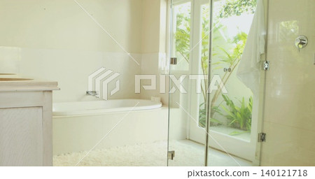 Featuring built-in alcove bathtub gleaming with chrome faucet in home bathroom, showing plush rug Featuring built-in alcove bathtub gleaming with chrome faucet in home bathroom, showing plush rug 140121718