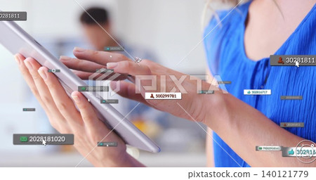 Tapping coworker in bright blue sleeveless top holding tablet in office, showing UI overlays, ring Tapping coworker in bright blue sleeveless top holding tablet in office, showing UI overlays, ring 140121779