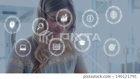 Sitting woman wearing light blue lace blouse studying at desk in bright room, translucent UI icons Sitting woman wearing light blue lace blouse studying at desk in bright room, translucent UI icons 140121795
