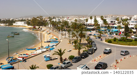 View of narrow promenade of Mediterranean sea in Hammamet, Tunisia View of narrow promenade of Mediterranean sea in Hammamet, Tunisia 140122035