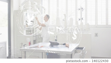 Adjusting prosthetic tech in scrubs reaching and checking gear in lab with socket, HUD, copy space Adjusting prosthetic tech in scrubs reaching and checking gear in lab with socket, HUD, copy space 140122430