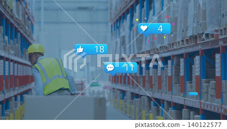 Checking man in yellow hardhat and hi-vis vest moving pallet in warehouse, social icons, copy space Checking man in yellow hardhat and hi-vis vest moving pallet in warehouse, social icons, copy space 140122577