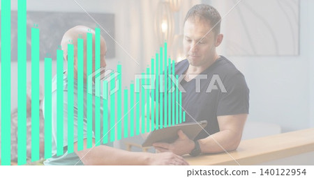 Leaning men wearing mint polo and dark V-neck reviewing tablet at reception desk, with teal overlay Leaning men wearing mint polo and dark V-neck reviewing tablet at reception desk, with teal overlay 140122954