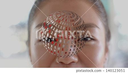 Framing adult Chinese woman facing camera indoors, showing silver hoop nose ring and binary sphere Framing adult Chinese woman facing camera indoors, showing silver hoop nose ring and binary sphere 140123051
