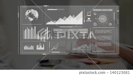 Filling frame transparent digital dashboard overlay showing charts over desk, hands typing laptop Filling frame transparent digital dashboard overlay showing charts over desk, hands typing laptop 140123081