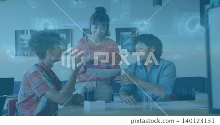 Presenting woman in coral sweater pointing at documents at office meeting table, with HUD overlay Presenting woman in coral sweater pointing at documents at office meeting table, with HUD overlay 140123131