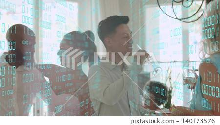 Smiling central man wearing light shirt sipping champagne flute at home dining, teal binary overlay Smiling central man wearing light shirt sipping champagne flute at home dining, teal binary overlay 140123576