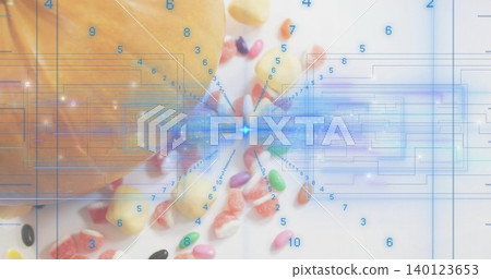 Showing partial peach on white table, candies, blue circuits, starburst digits, copy space 140123653