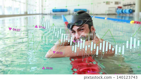 Leaning swimmer smiling on red divider at pool wearing black cap red trunks showing overlaid charts Leaning swimmer smiling on red divider at pool wearing black cap red trunks showing overlaid charts 140123743