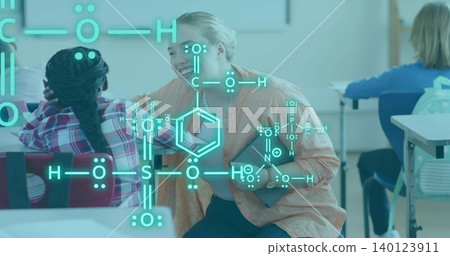 Crouching teacher leaning toward girl at school, holding tablet with chemical overlay, plaid shirt Crouching teacher leaning toward girl at school, holding tablet with chemical overlay, plaid shirt 140123911