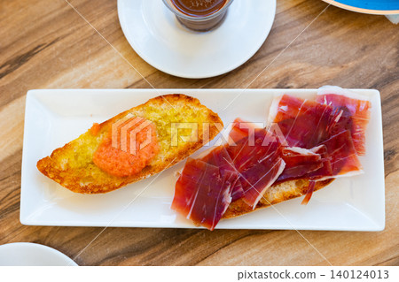 Ham sandwich and coffee served for breakfast Ham sandwich and coffee served for breakfast 140124013