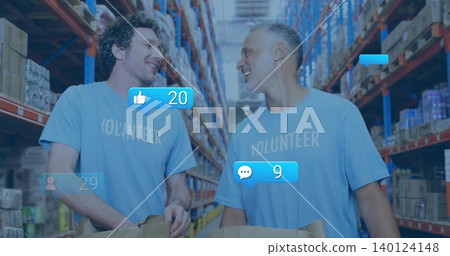 Talking two men in light-blue VOLUNTEER shirts holding brown-bags in warehouse aisle, racks, icons Talking two men in light-blue VOLUNTEER shirts holding brown-bags in warehouse aisle, racks, icons 140124148