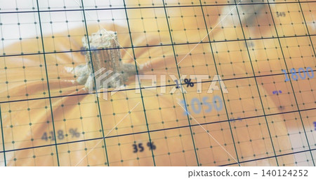 Showing orange pumpkin revealing top with short stem on table, with grid, numbers, droplets Showing orange pumpkin revealing top with short stem on table, with grid, numbers, droplets 140124252