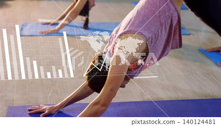 Bending woman performing forward bend in studio on purple mat in pink top with AR overlay Bending woman performing forward bend in studio on purple mat in pink top with AR overlay 140124481