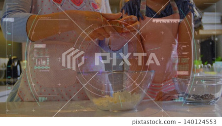 Mother and daughter cracking egg over glass mixing bowl at kitchen counter, with chips, aprons, HUD Mother and daughter cracking egg over glass mixing bowl at kitchen counter, with chips, aprons, HUD 140124553
