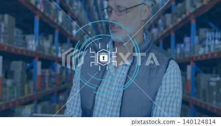 Inspecting man wearing checked shirt, vest, holding tablet in warehouse racks, padlock overlay 140124814