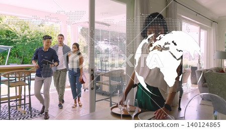 Placing plates, glasses host green-apron arranging diningtable home man holding tablet globeoverlay Placing plates, glasses host green-apron arranging diningtable home man holding tablet globeoverlay 140124865