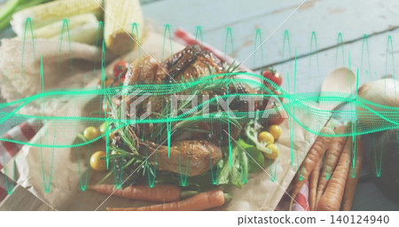 Showing roast poultry on paper at rustic gray table with rosemary, carrots, teal waveform overlay Showing roast poultry on paper at rustic gray table with rosemary, carrots, teal waveform overlay 140124940
