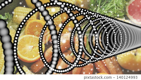 Featuring dotted spiral dominating tabletop, overlaying halved orange, carrots, corn, greens Featuring dotted spiral dominating tabletop, overlaying halved orange, carrots, corn, greens 140124993