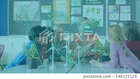 Teaching teacher in orange sweater guiding kids in classroom, viewing turbines, plants and hologram Teaching teacher in orange sweater guiding kids in classroom, viewing turbines, plants and hologram 140125129