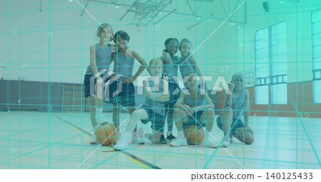 Posing seven kids wearing matching sleeveless jerseys and shorts in school gym, two basketballs Posing seven kids wearing matching sleeveless jerseys and shorts in school gym, two basketballs 140125433