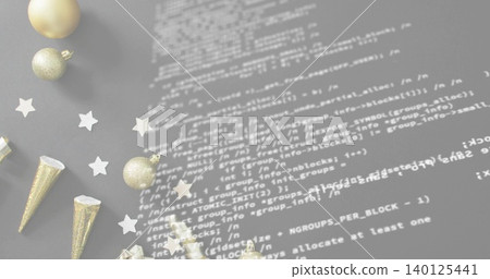 Showing gold baubles, cones and star confetti on gray tabletop with white code overlay, copy space Showing gold baubles, cones and star confetti on gray tabletop with white code overlay, copy space 140125441