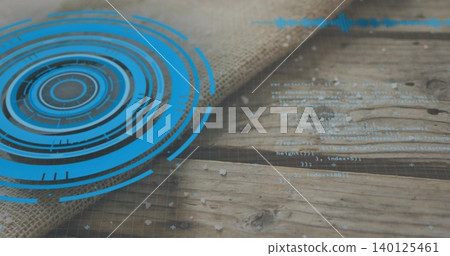 Showing blue HUD graphic on left of wooden plank table, overlaying burlap, code, flakes, copy space 140125461