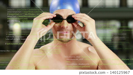 Adjusting bare-chested male swimmer fixing black swim goggles with blue cap at pool, code overlay 140125967