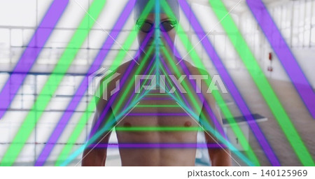 Standing shirtless swimmer wearing swim cap and goggles on pool deck, with neon triangles Standing shirtless swimmer wearing swim cap and goggles on pool deck, with neon triangles 140125969