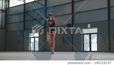 Balancing gymnast holding red-baton in gym wearing black leotard pink fringe with blue map overlay Balancing gymnast holding red-baton in gym wearing black leotard pink fringe with blue map overlay 140126147