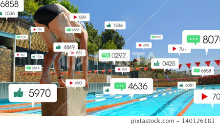 Crouching swimmer, briefs timing-strap preparing to dive on block at pool, social icons, copy space Crouching swimmer, briefs timing-strap preparing to dive on block at pool, social icons, copy space 140126181