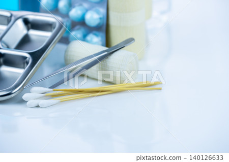 Medical equipment for treating infections. Wound care dressing set. Medical supplies for nurses. Conform bandage, forceps, cotton stick, alcohol. Sterile dressing materials. Healthcare equipment. 140126633