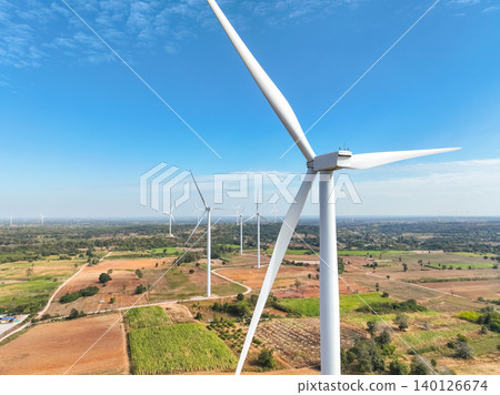 Wind energy and sustainable power generation with wind turbines, Eco-friendly solutions for renewable resources. Wind power farm and sustainable development of renewable energy, green technology. Wind energy and sustainable power generation with wind turbines, Eco-friendly solutions for renewable resources. Wind power farm and sustainable development of renewable energy, green technology. 140126674