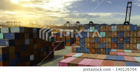 Container logistic. Logistics and transportation of container cargo ship at ship port. Container truck and crane bridge in shipyard. Transport industry. Terminal port for export transport by ship. Container logistic. Logistics and transportation of container cargo ship at ship port. Container truck and crane bridge in shipyard. Transport industry. Terminal port for export transport by ship. 140126704