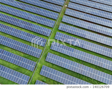 Aerial view of solar farm. Sustainable renewable energy and modern photovoltaic technology for eco-friendly electricity production. Solar power station. Green energy solutions. Solar panel technology. 140126709