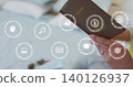 Holding mid adult woman holding passport in bedroom, wearing yellow sleeve, ring, icons, copy space 140126937